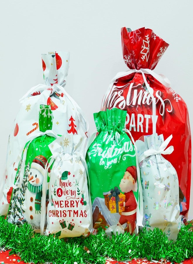 KatchOn, 30PCS Drawstring Christmas Bags Bulk - Assorted Sizes | Xmas Drawstring Gift Bags for Xmas Party Favors | Wrapping bags for Holiday Decorations, Christmas Decorations Indoor - Image 1
